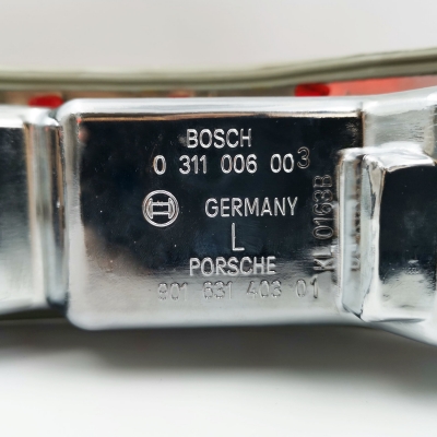 Preview: Heckleuchte, links, USA, für Porsche 911/912 Bj.65-68, original Produktion, Bosch, Gehäuse Metall        90163140301